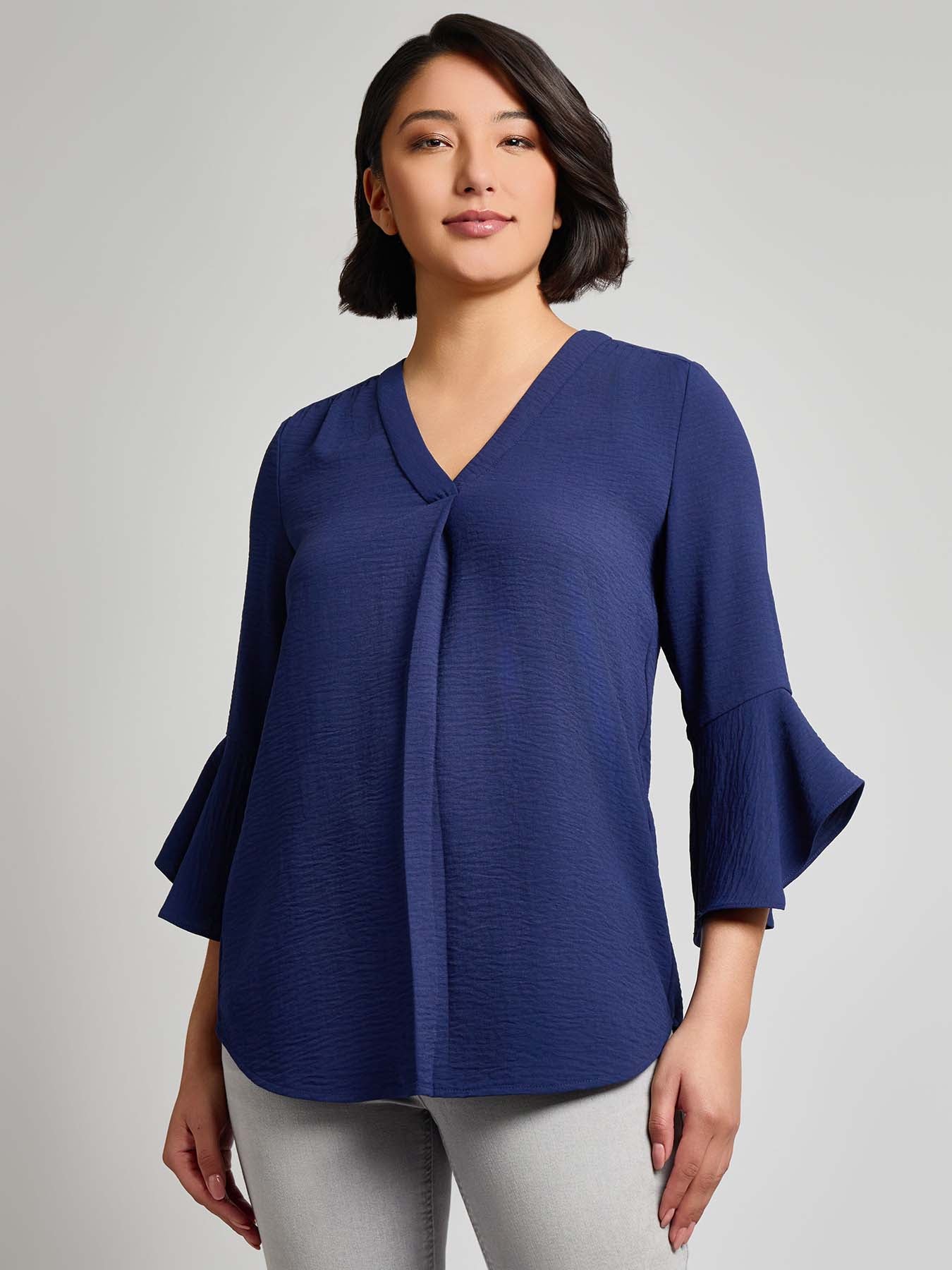 Flutter and flowy short sleeve women’s blouse.